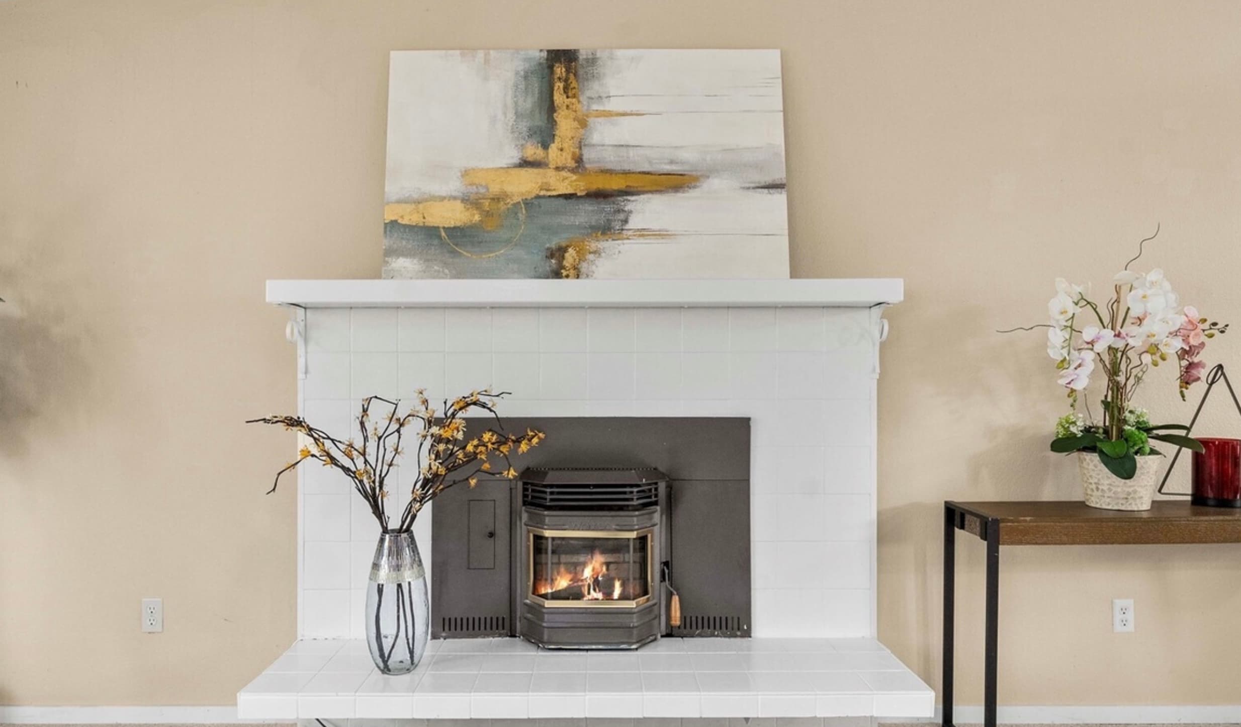 Living Room — White Brick Fireplace with Gold Abstract Art & Pellet Insert
