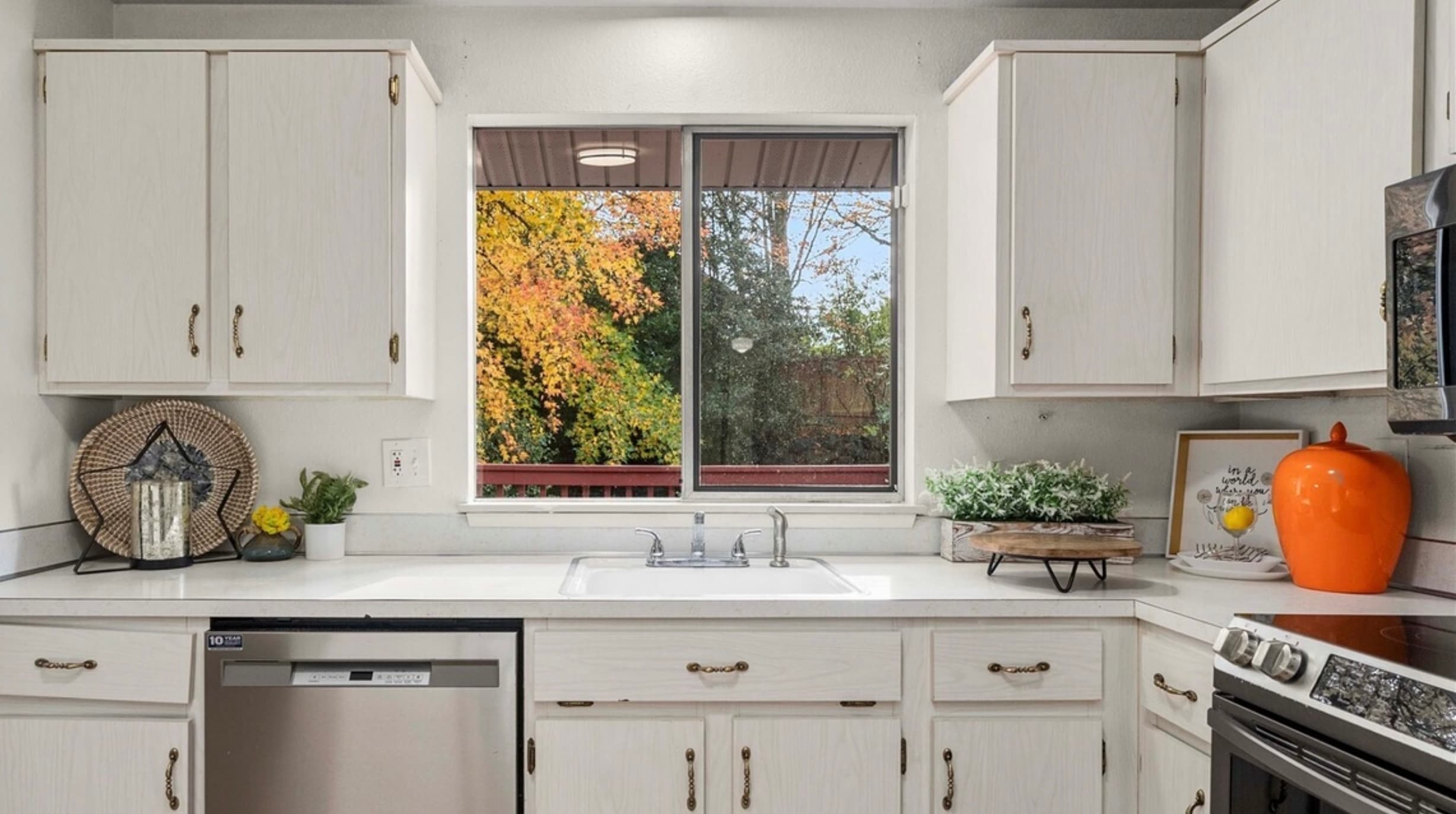 Kitchen — Sink with Fall Foliage Window & Wicker Charger Decor