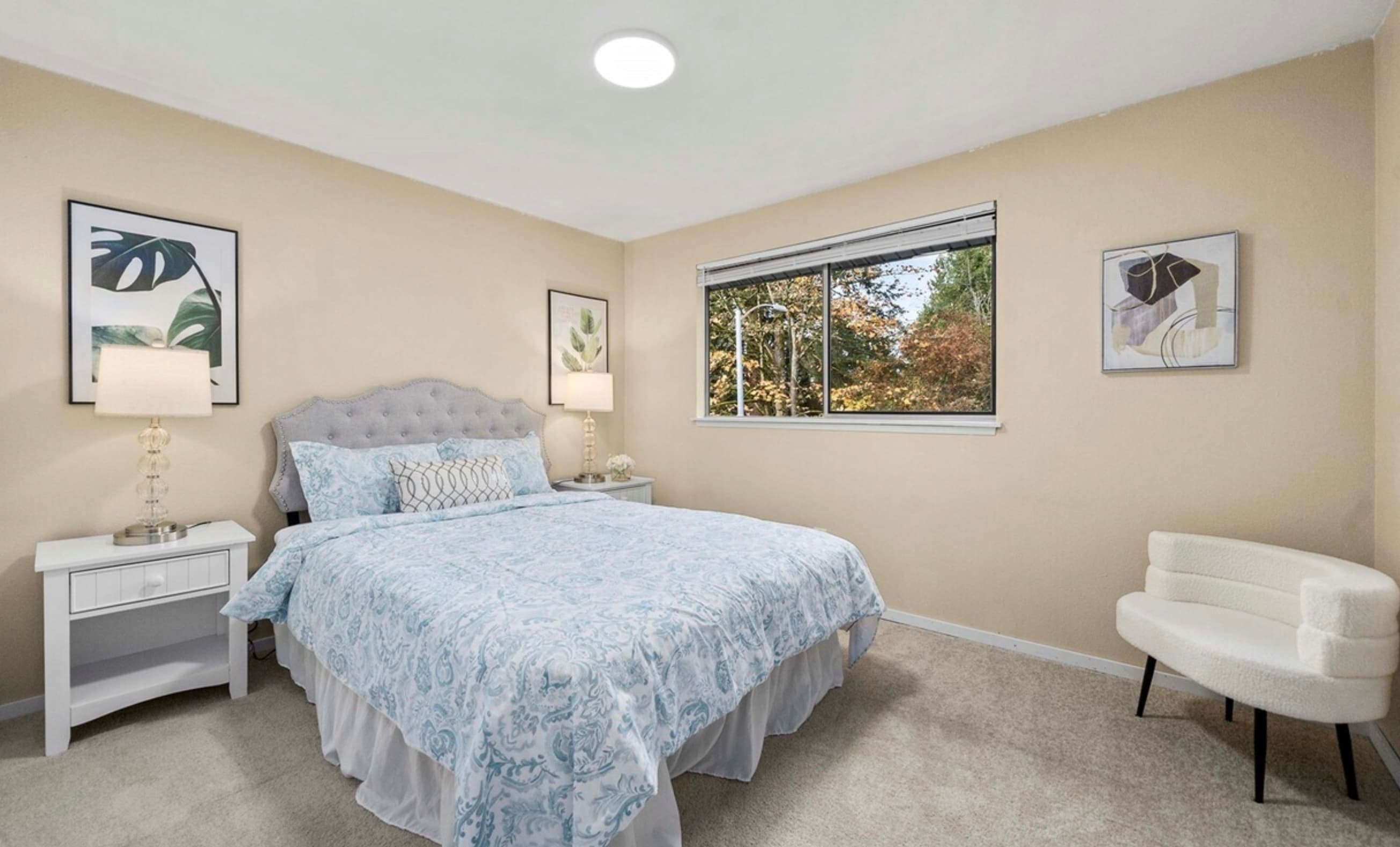 Guest Bedroom — Gray Scalloped Headboard, Blue Damask Bedding & Accent Chair