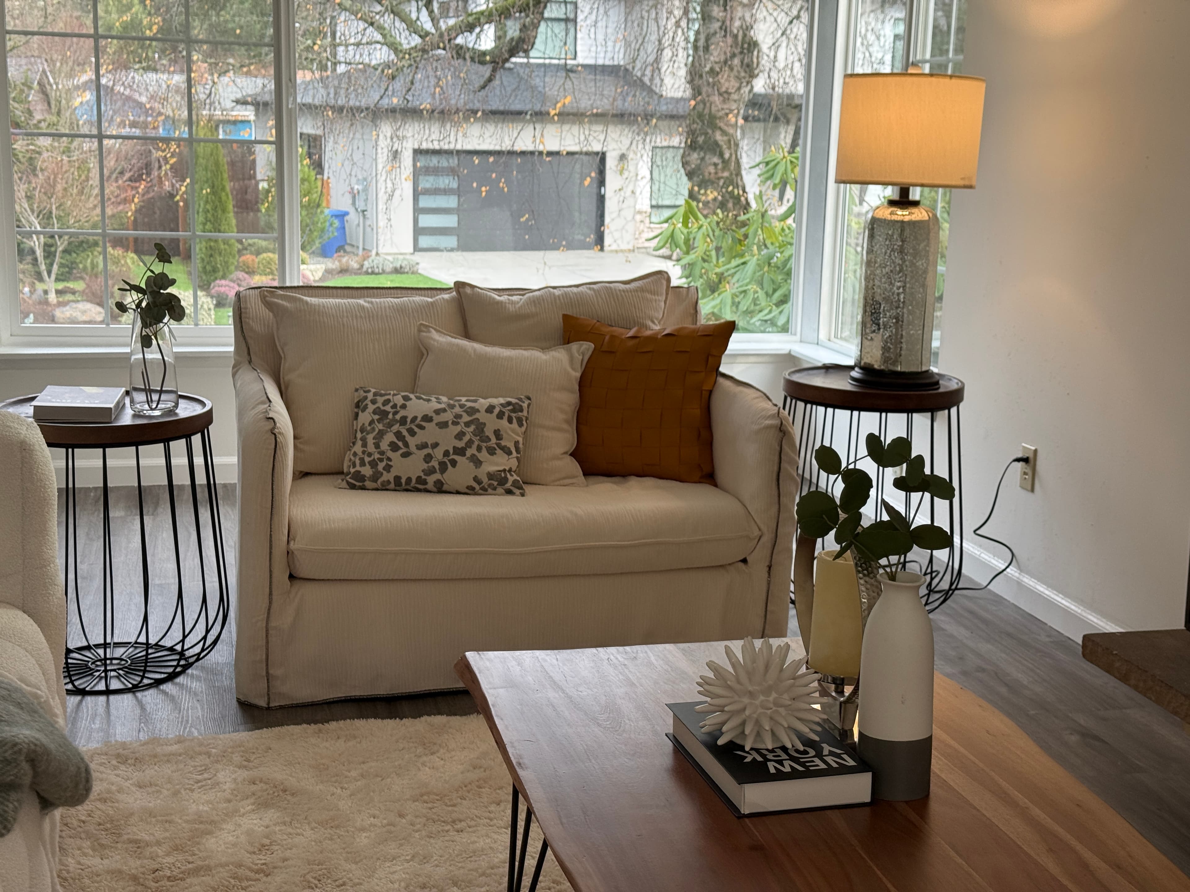 Living Room — Cream Chair, Wire Side Tables & Large Bay Windows