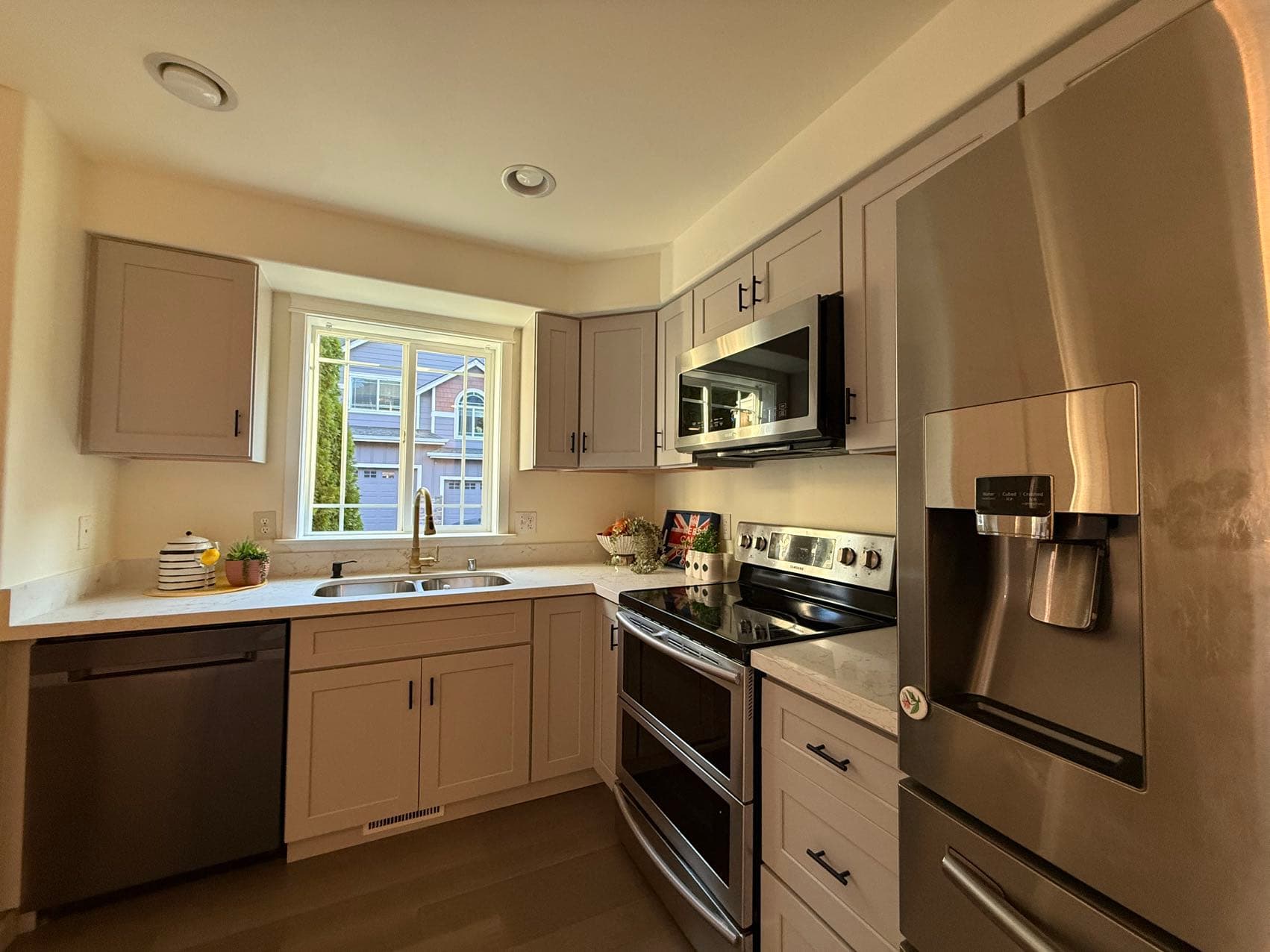 Kitchen — Gray Shaker Cabinets & Stainless Appliances